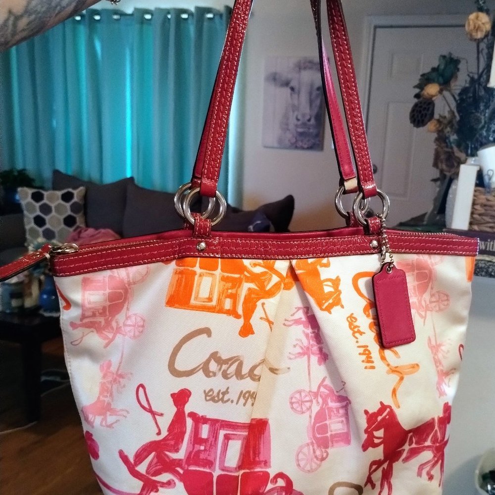 Authentic Coach handbag numbered. EUC, stain on inside interior.